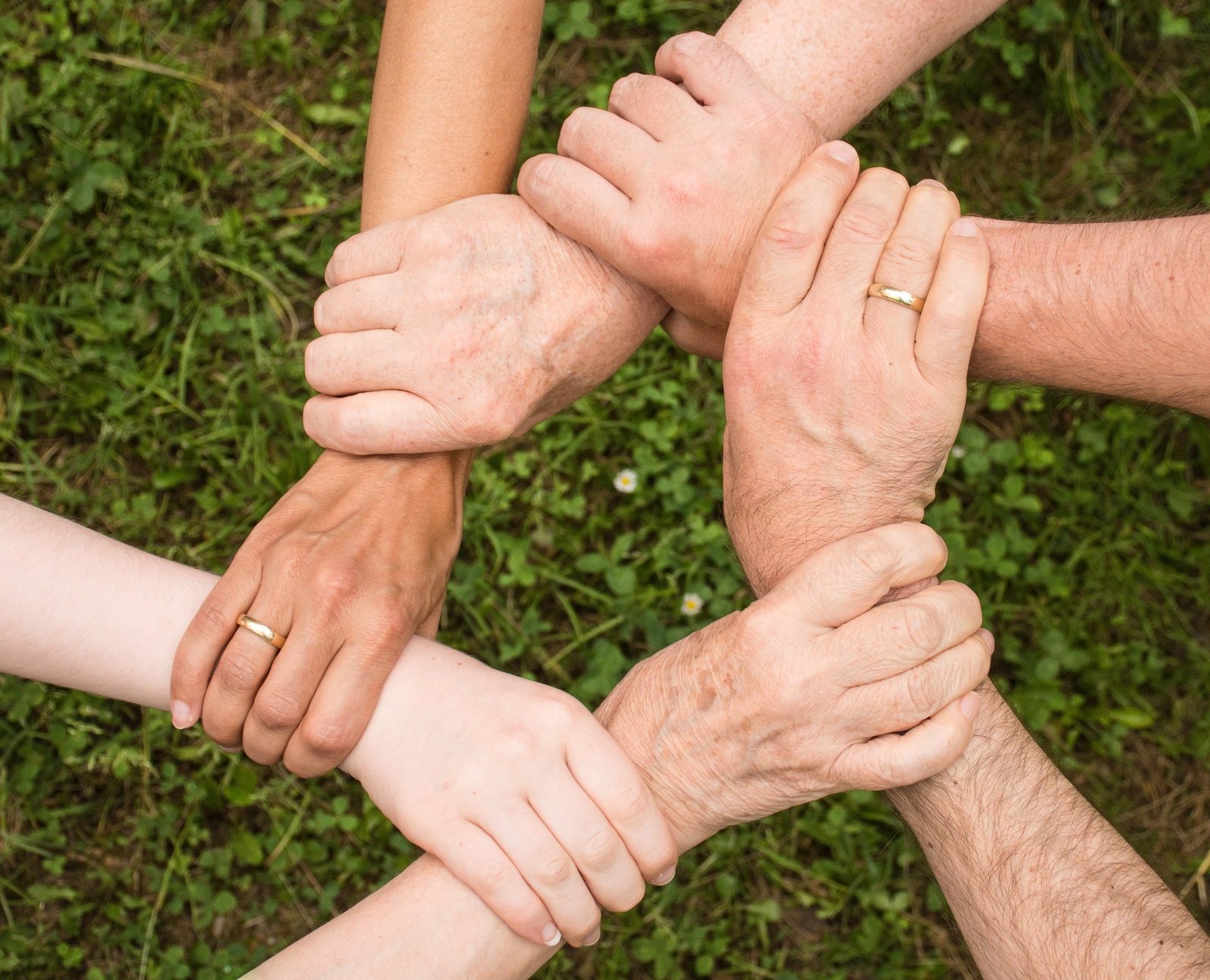 Hands joined together — community